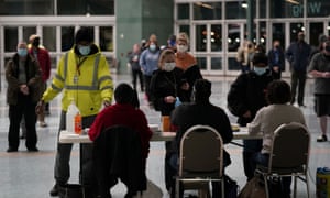 Voters arrive to cast their ballots at the Kentucky Exposition Center.