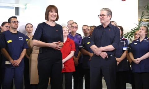 Keir Starmer and Rachel Reeves with members of staff, during a visit to University Hospital Coventry and Warwickshire.