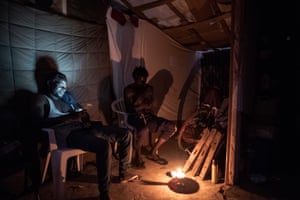 Asuma at his friend Thierno’s place in the camp of San Ferdinando.