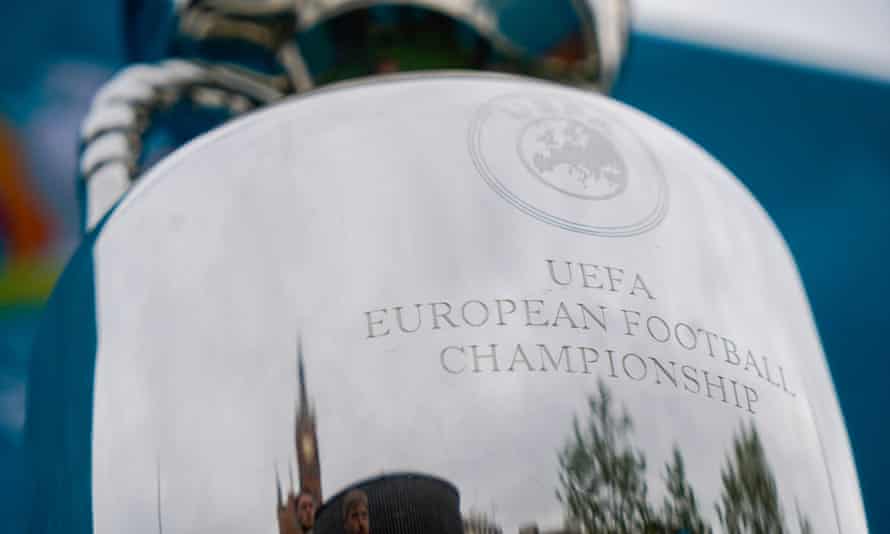 Kings Cross station in London is reflected in the European Championship trophy during the buildup for the continent-wide tournament