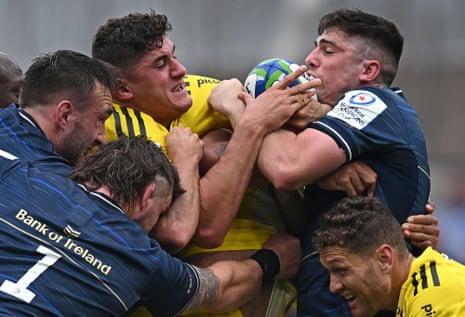 La Rochelle's French flanker Paul Boudehent (centre) fights for the ball during the European Champions Cup final rugby union match against Leinster.