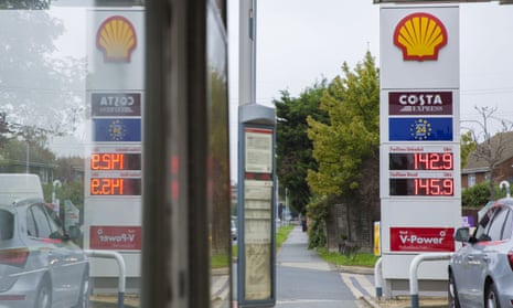 Petrol prices are displayed at a petrol station in east London