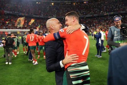 Martínez embraces Cristiano Ronaldo after Portugal’s penalty shootout victory against Spain in last year’s Nations League final