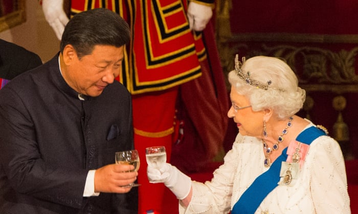 President Xi Jinping and the Queen raise their glasses on his state visit to Britain in 2015.