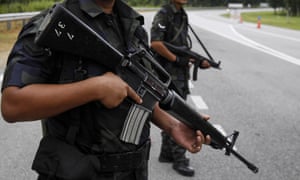 Malaysian Police stand guard