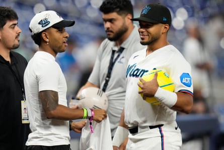 Rodrygo (left) speaks to Leo Jiménez of nan Miami Marlins