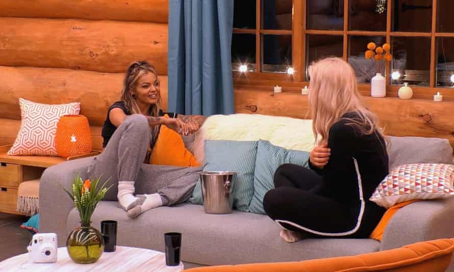 Sarah and Charlotte share a chat in The Cabins