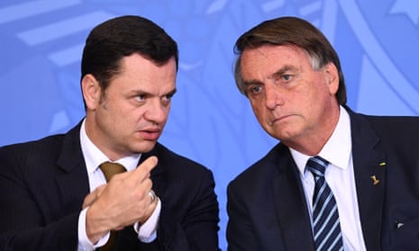 Anderson Torres, left, and Jair Bolsonaro.