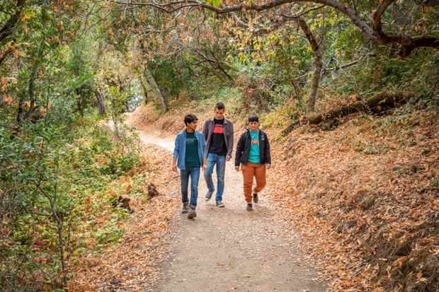 jain, forbes and esposito walk through woods