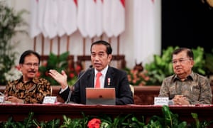 President Joko Widodo (centre) announces the location of the countryâs new capital city during a press conference in Jakarta.