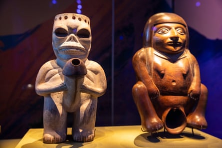 Ceramics representing the dead (left) and a woman either giving birth or preparing for coitus in the Australian Museum’s Machu Picchu exhibition
