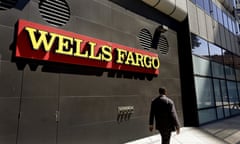 Wells Fargo<br>FILE - In this July 14, 2014, file photo, a man passes by a Wells Fargo bank office in Oakland, Calif. Regulators announced Thursday, Sept. 8, 2016, that Wells Fargo is being fined $185 million for illegally opening millions of unauthorized accounts for their customers in order to meet aggressive sales goals. (AP Photo/Ben Margot, File)