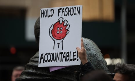 A sign saying 'Hold Fashion Accountable' held up at the Fashion Act Rally