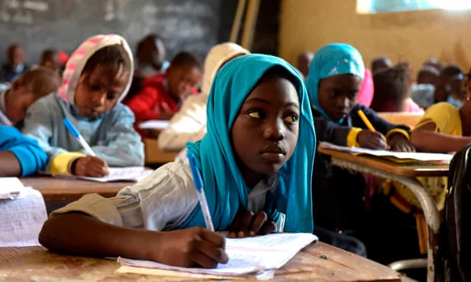 Pupils attend class at a primary school in Pikine, on the outskirts of Dakar, on 30 January 2018.
