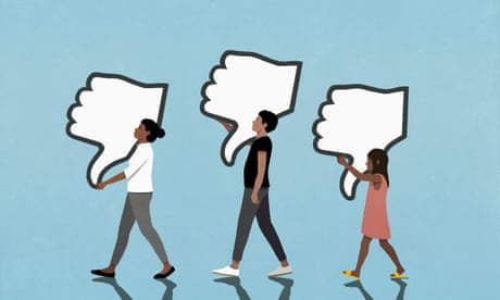 People carrying social media dislike buttons on blue background