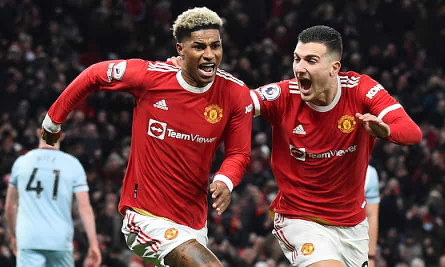 Marcus Rashford (left) celebrates his late winner for Manchester United against West Ham. Can anyone stop them from finishing in the top four?