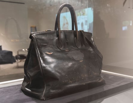 The bag carries traces of stickers Birkin put on the leather.