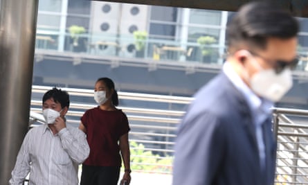Residents of Bangkok, Thailand, wear masks to protect themselves against pollution.