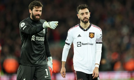 Bruno Fernandes (right) and Alisson Becker