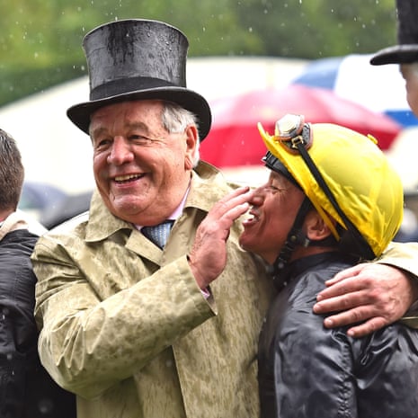 Frankie Dettori celebrates with trainer, Sir Michael Stoute after he and Crystal Ocean win the Prince of Wales’s Stakes at Royal Ascot.