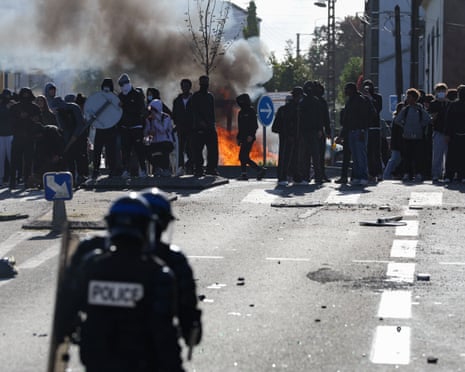 Anti-riot police face off with protesting students carrying out blockading action at the Lycee Kerichen secondary school, in Brest in western France.