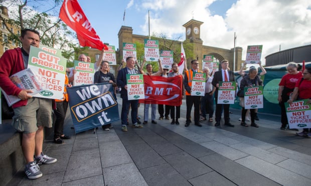 Protesters stage a demonstration outside Kings Cross Station in London against the closure of rail ticket offices. 