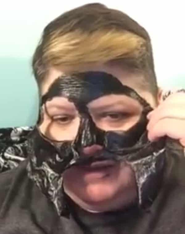 Tiff struggles with her charcoal face mask in a shot from her video. Photograph: YouTube