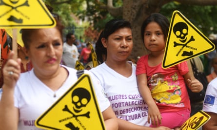 Salvadorans at a protest against mining outside the Legislative Assembly in San Salvador on 29 March.