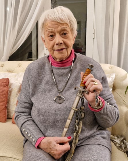 Lola Hassid Angel holding a dagger