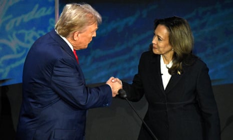 Kamala Harris shakes hands with former US President and Republican presidential candidate Donald Trump during the presidential debate in Philadelphia, Pennsylvania, on 10 September, 2024.