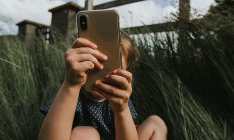 Children are spending more time on phones, with girls more likely to use social media.