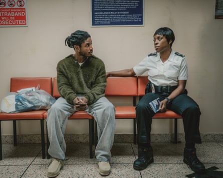 Francis Lovehall as Dris and Ronke Adekoluejo as Officer Stephens in Waiting for the Out.