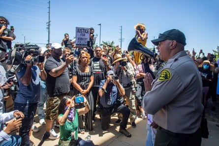Protesters demonstrate in front of the Palmdale Sheriff’s Station after Fuller’s death.