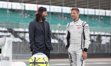 Keanu Reeves and Jenson Button in Brawn: The Impossible Formula 1 Story.