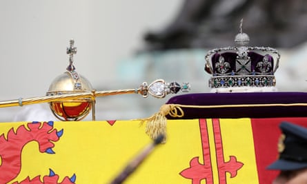 The state crown, orb and sceptre sit on top of the coffin of Queen Elizabeth II in September 2022.