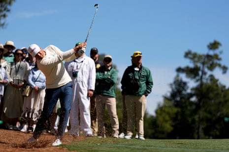 Wyndham Clark hits from the pine straw on the second hole.