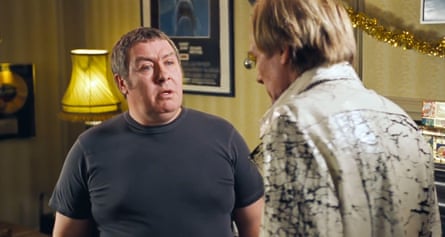 With Bill Nighy in Love Actually.