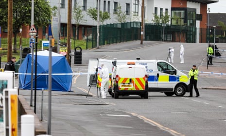 A police forensic science team at work at the scene in Blackburn on Sunday.