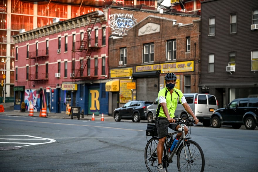 A volunteer for the heat mapping project rides through Mott Haven.