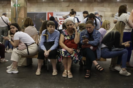 People take shelter in a station during an air alert on Monday.