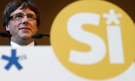 The Catalan president, Carles Puigdemont, attends a pro-independence rally