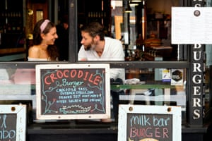 People dine at a cafe in Melbourne.