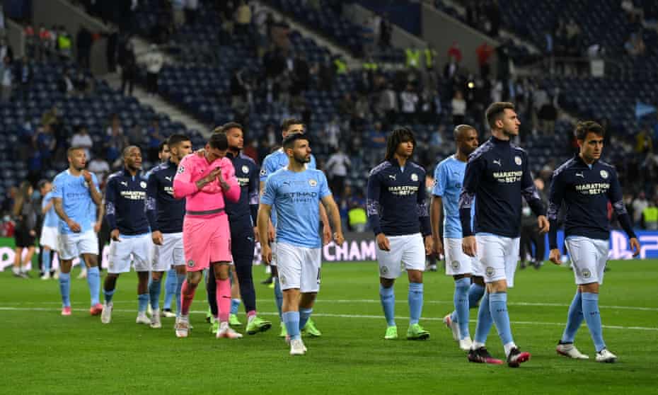 Manchester City’s players get ready to collect their unwanted silver medals.