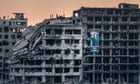 Skeleton cities and snipers: the shocking photographs that show the scale of Syria's loss