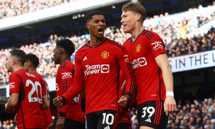 Manchester United’s Marcus Rashford celebrates scoring at Manchester City in March with Scott McTominay