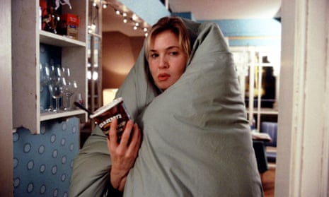 Renée Zellweger heartbroken in Bridget Jones' Diary under a duvet and eating ice cream.