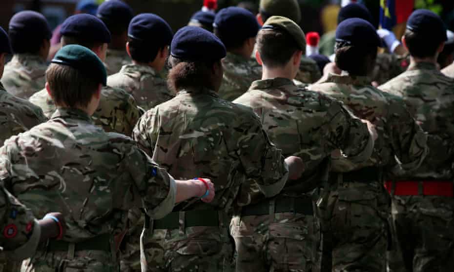 Female military personnel marching