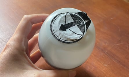 A plastic sphere of black garment dye.