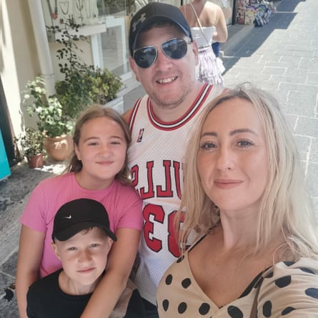 Family photograph, all half smiling