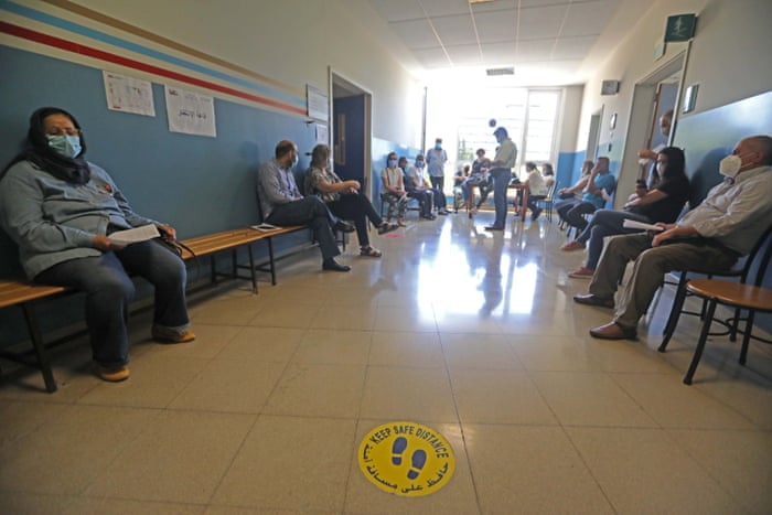 People wait to receive the Covid-19 vaccine at a medial center in Beirut, Lebanon, on 24 May 2021. Lebanon launched on Monday the vaccination campaign for the public sector and foreign expatriates in the country.